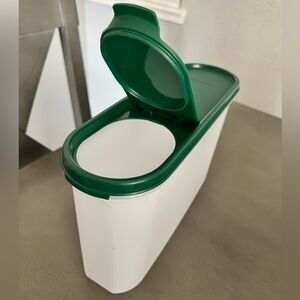 Tupperware container with green lid